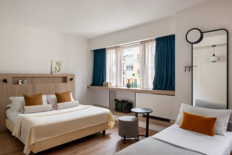 Bright family room with double bed, single bed and modern decor for comfortable stays - Aparthotel Colombo, BZAR hotels in Rome