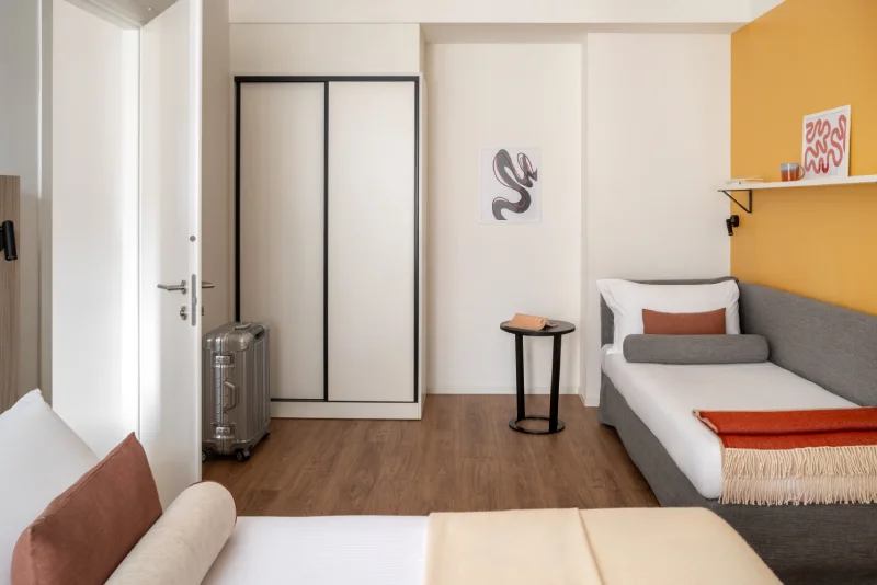 Family suite with double bed, sofa bed, spacious wardrobe and dedicated relaxation areas - Aparthotel Colombo, BZAR hotels in Rome